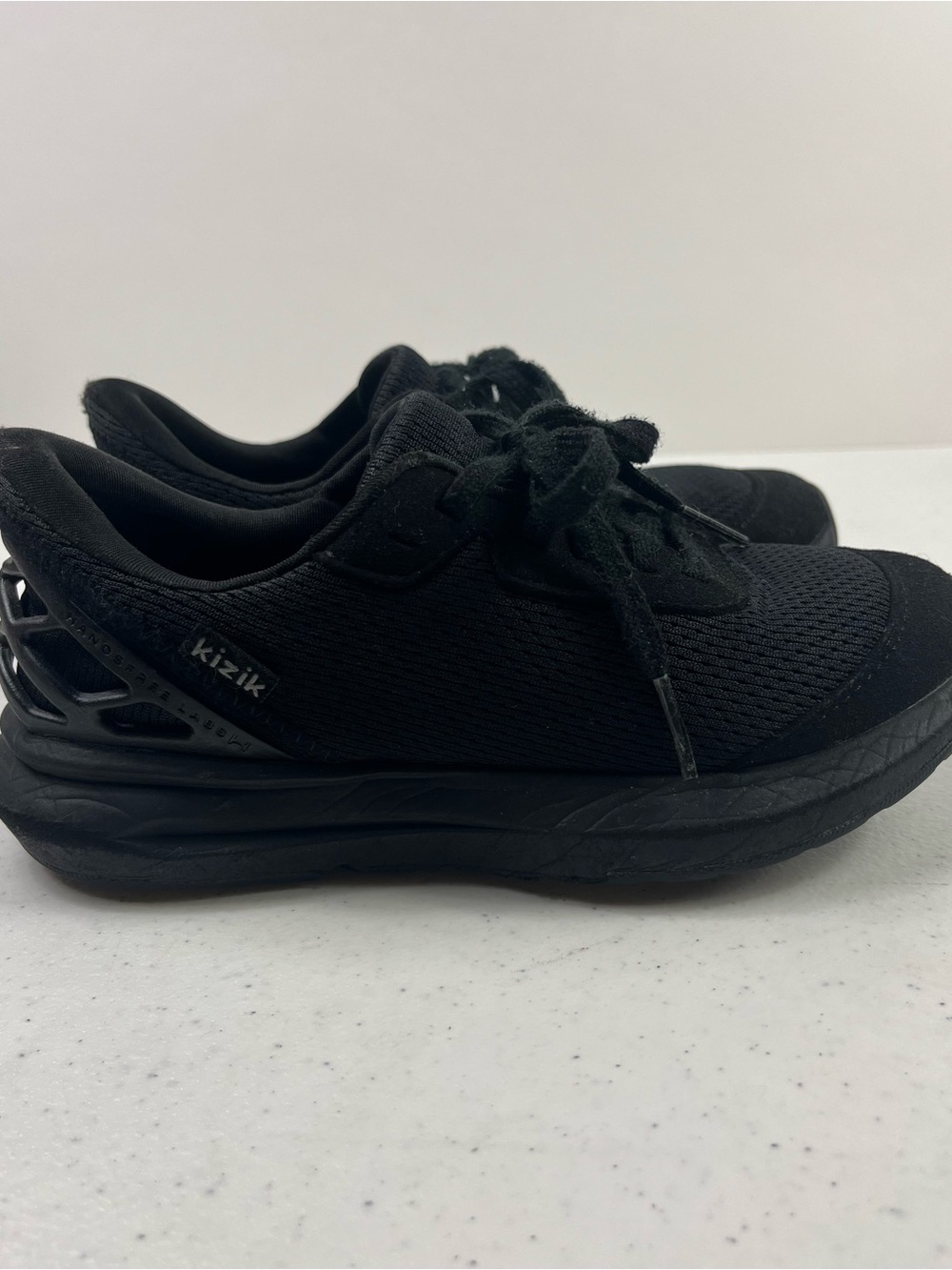 Kizik Kids All-Black Slip-On Athletic Shoe